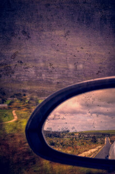 South Africa: blurred landscape seen in the rearview mirror of a car speeding along the N2, the famous Garden Route, a stretch of the south-eastern coast from the Western Cape to the Eastern Cape