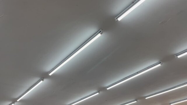 Low angle of triple parallel linear LED lights on ceiling