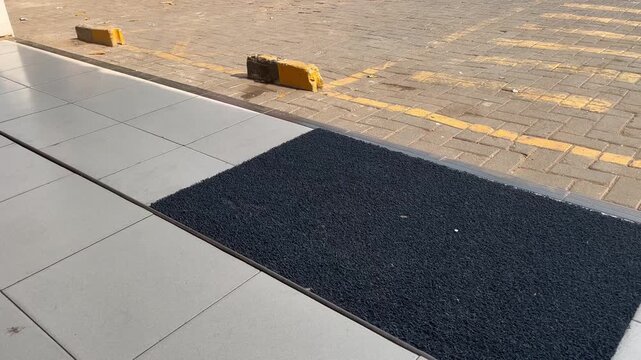 Empty Urban Parking Lot with Concrete Stoppers