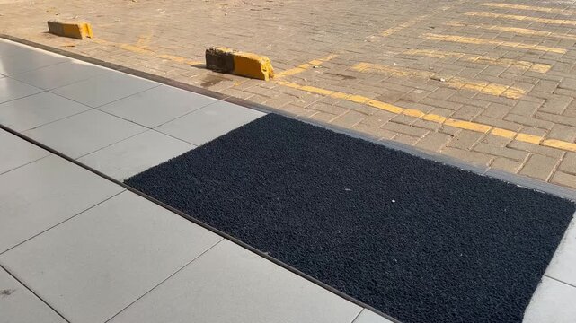 Empty Outdoor Car Park with Yellow Lines