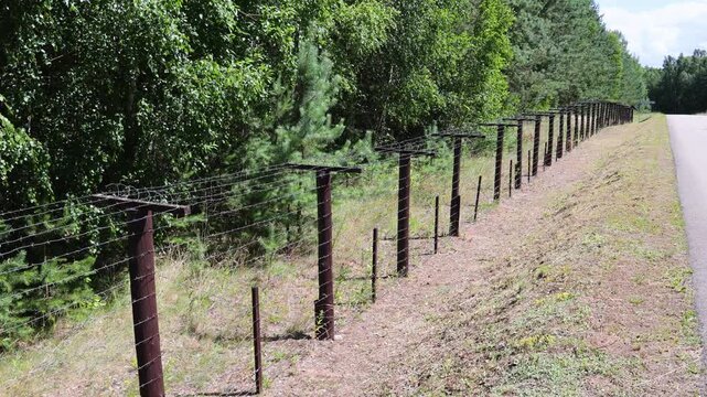 Former Soviet-Polish border fence with barbed wire in Lazdijai District, Lithuania