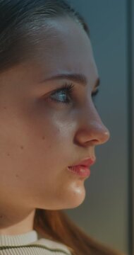 Teen Girl Resting by School Lockers During Break, Lost in Thought after Demanding Day. Concept Mental Health, Personal Reflection, Emotional Awareness, Growing Up, Student Experiences. Vertical Shot.