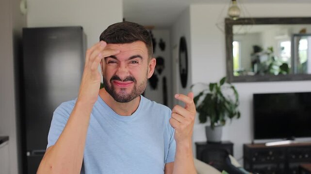 A 40 year old man showing crow feet and forehead wrinkles