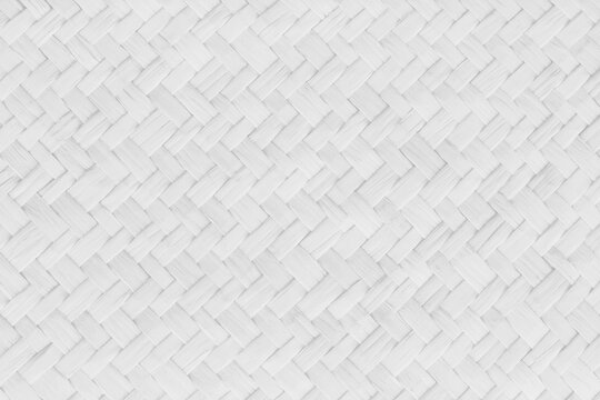 Pattern of white old reed weaving mat with vintage style for background and design art work.