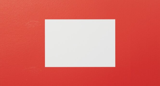 White Rectangle Paper on Red Background with Negative Space