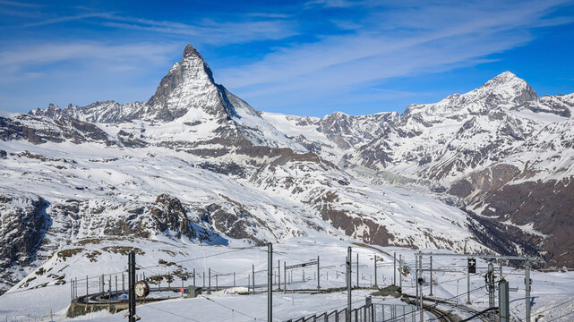 The landscape view of Iconic Matterhorn Peak  mountain and Gornergrat Railway in Winter background	