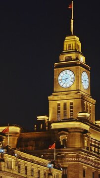 Shanghai, China. Clock tower of Shanghai, soaring beautifully at night. The Bund, Shanghai Custom House Building, The Clock Tower
