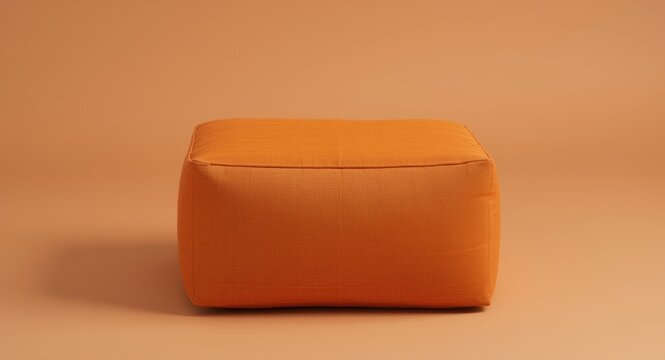 Orange Fabric Pouf on a Solid Color Background