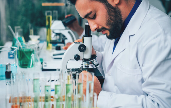 Scientist or researchers working in science laboratory, medical technology research work, science laboratory research and development concept.