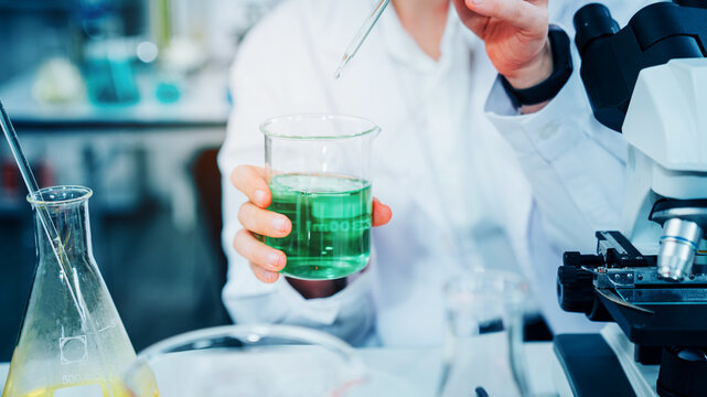 Scientist or researchers working in science laboratory, medical technology research work, science laboratory research and development concept.
