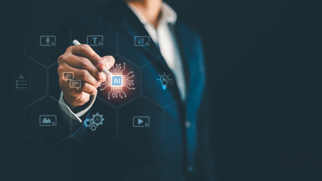 Businessman using stylus pen touching glowing AI chip icon with multimedia content creation icons on digital screen. Concept for generative artificial intelligence, machine learning, technology