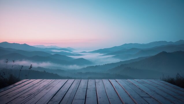 Misty Mountain Landscape at Sunrise with Wooden Deck in the Foreground