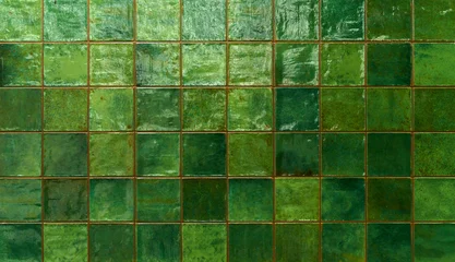 Green ceramic tile background. Old vintage ceramic tiles in green to decorate the kitchen or bathroom © uladzimirzuyeu