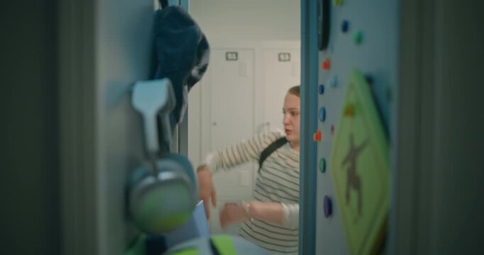 Teenage Boys Open Locker Out of Curiosity before Female Classmate Steps in, Checks Belongings, Firmly Confronts. Personal Boundaries, Respect for Privacy, Peer Interaction, Everyday Student Life.