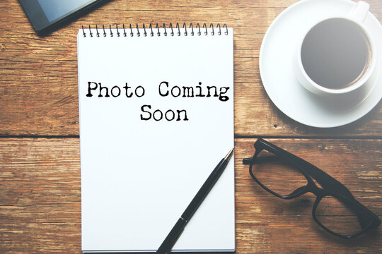 Concept of Photo Coming Soon write on sticky notes
