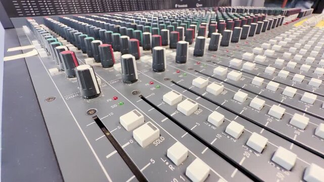 A vintage audio mixing console sits inside Lenfilm in Saint Petersburg. This classic sound equipment inspires nostalgic wonder and creative awe.