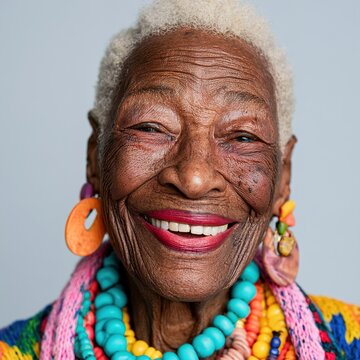 Senior black woman smiling, enjoying life and colorful fashion