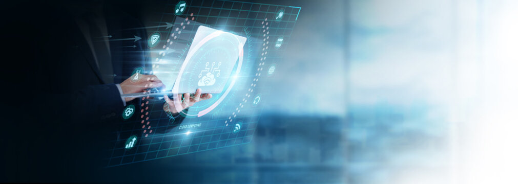 Businessman Using Laptop for Analyzing Cloud Computing Data. Managing online infrastructure, improving data storage solutions, optimizing digital services, and supporting scalable technology platforms