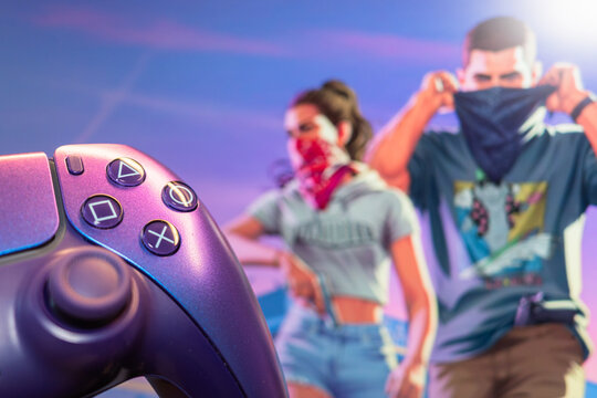 YEREVAN, ARMENIA - 08.18.2026: Sony PlayStation 5 DualSense controller with the official Grand Theft Auto VI artwork and logo in the background. High quality