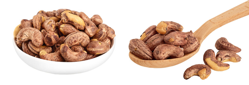 cashew nut with shell in ceramic bowl isolated on white background