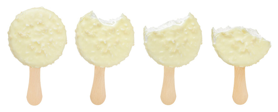 Bitten coconut Ice cream bar with white chocolate coating isolated on white background.