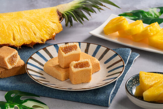 Traditional Taiwanese pineapple cake pastry served on ceramic plate.