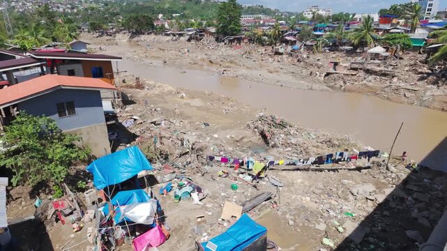 Walking shot documents severe typhoon destruction along a riverbank, Cebu