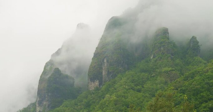 4K video; timelapse of clouds and fog moving over densely vegetated mountains on the isle of Madeira, Portugal