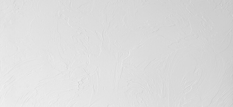 White textured plaster wall background with Venetian decorative strokes, clean minimalist surface backdrop