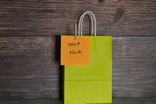 Eco friendly paper shopping bags for retail sale discounts.