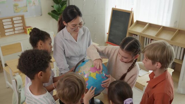 Teacher Children Classroom Globe Geography Lesson Education Student Group Learning Explore Colorful World Cooperation Curiosity Together Diverse Educational Activity Bright Room Attentive Guidance