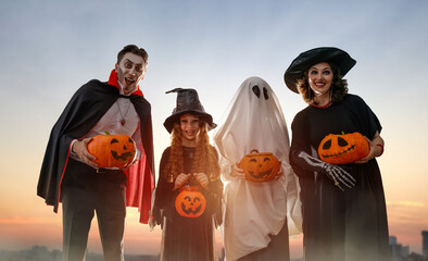 Fototapeta premium Group of Happy Friends in Halloween Costumes