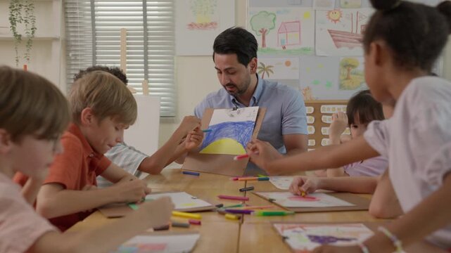 Teacher Guiding Child Creativity Through Classroom Drawing Education With Pencil Artwork Paper, Collaborative Art Activity, Colorful Creative Teamwork, Focused Learning, and Shared Artistic Expression