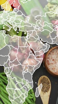 Animation of world map over table of vegetable