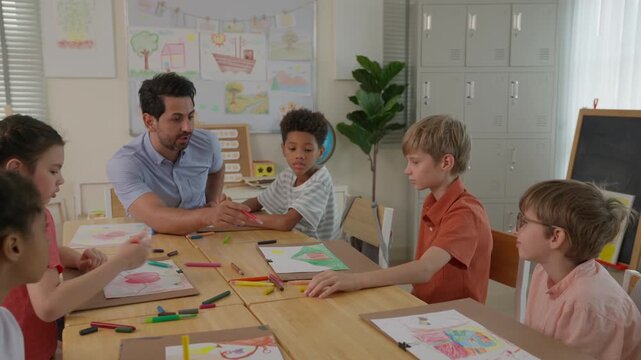 Collaborative Classroom Art Activity with Teacher and Diverse Children Drawing Colorful Artwork at Wooden Table, Creative Learning with Pencils, Paper, Posters, Lockers, Chalkboard, and Art Supplies