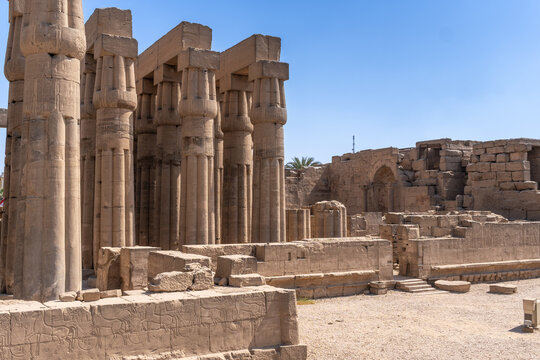 Luxor temple showcasing monumental stone columns and hieroglyphic carvings, representing rich egyptian history and archaeological wonders