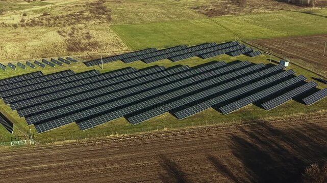 Aerial View of Solar Panel Field Producing Clean Renewable Electricity