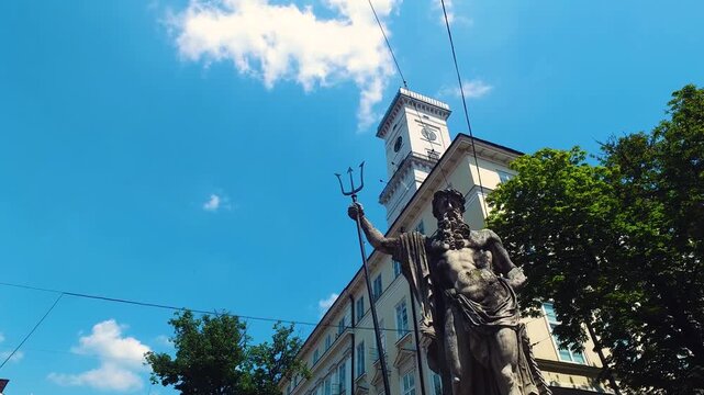 Neptune Statue on Rynok Square, Downtown Lviv Ukraine on Sunny Summer Day