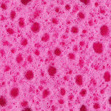 This seamless texture showcases a vibrant pink sponge with a dense, porous structure and tiny bubbles, perfect for abstract backdrops, pastel, structure, foam