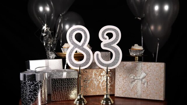 Silver Number 83 with Silver Glitter Sparkles with Gifts and Balloons and Cupcakes for Party Eighty Three