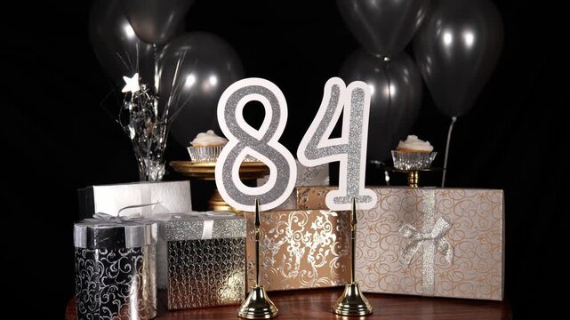 Silver Number 84 with Silver Glitter Sparkles with Gifts and Balloons and Cupcakes for Party Eighty Four