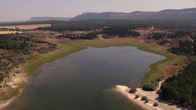 Aerial drone view flying over La Cuerda del Pozo reservoir in Soria province, Castilla y Leon, Spain