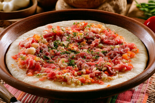 Brazilian cassava with raw meat and vegetables