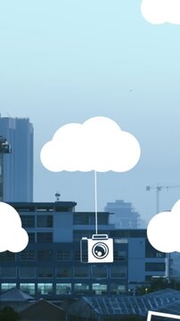 Animation of clouds with electronic devices over cityscape