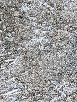 Close up view of porous aerated concrete block surface. Abstract construction material texture showing lightweight building structure, rough pattern, and modern architectural material concept.