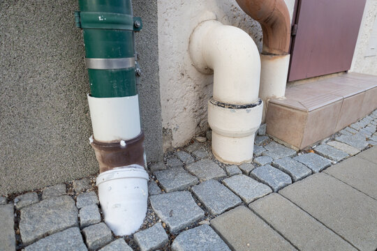 Drainage pipes attached to the exterior wall of a building