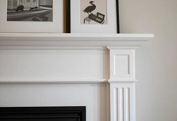 Fototapeta premium Home interior design and decor, white fireplace mantel with framed artwork, modern living room architecture detail