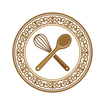 Crossed whisk and spoon in ornate circular frame.