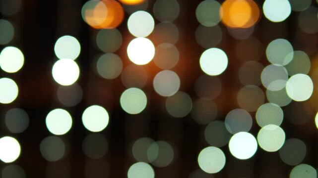 Bokeh lights no action static scene, in dark background with bokeh effect, with bokeh lights, from a neutral perspective perspective, with white, yellow accents, and elegant festive mood.