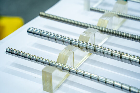 Metal Rolling Elements and Lead Screws on White Mounting Blocks